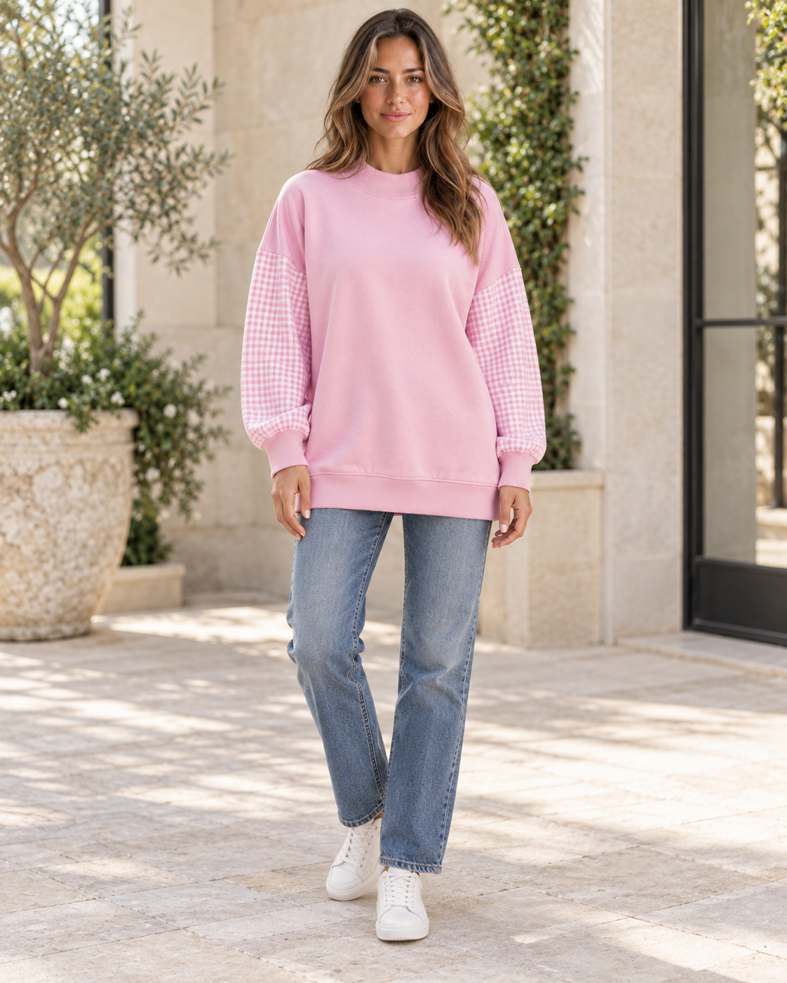 Wren Plaid-Sleeve Tunic Sweatshirt in Blush Pink, front view with jeans