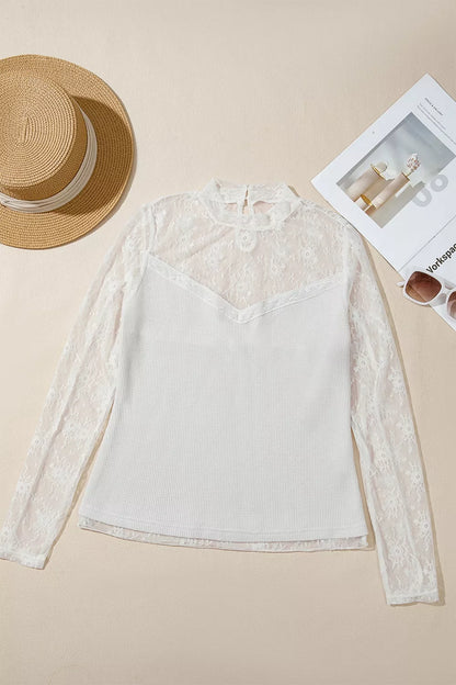 Flat lay of white lace mesh long-sleeve top, front view