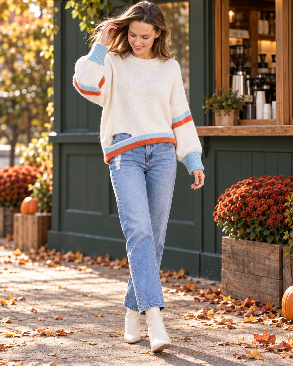 Colorblock cutout sweater in ivory styled for fall